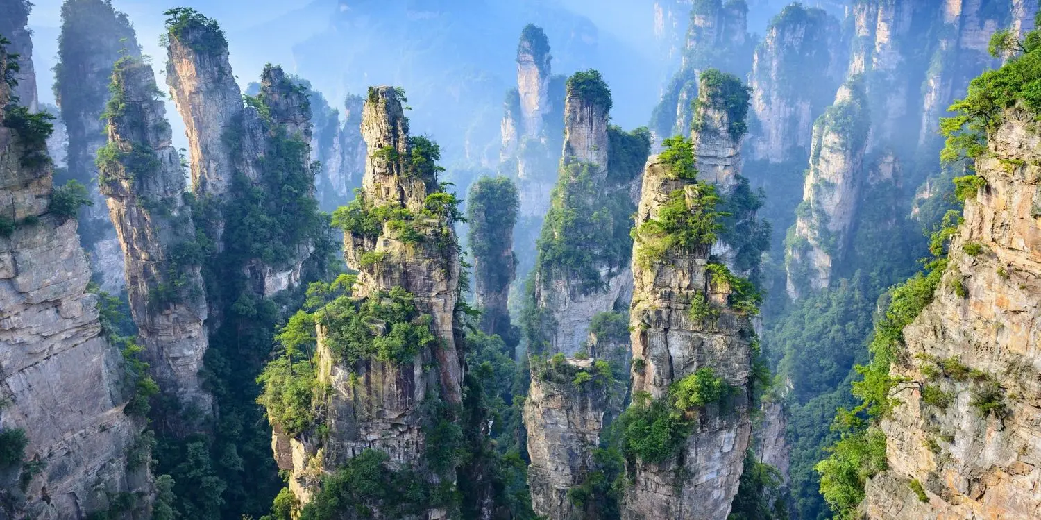 Towering sandstone pillars of Zhangjiajie National Forest Park in Wulingyuan, Hunan, China.