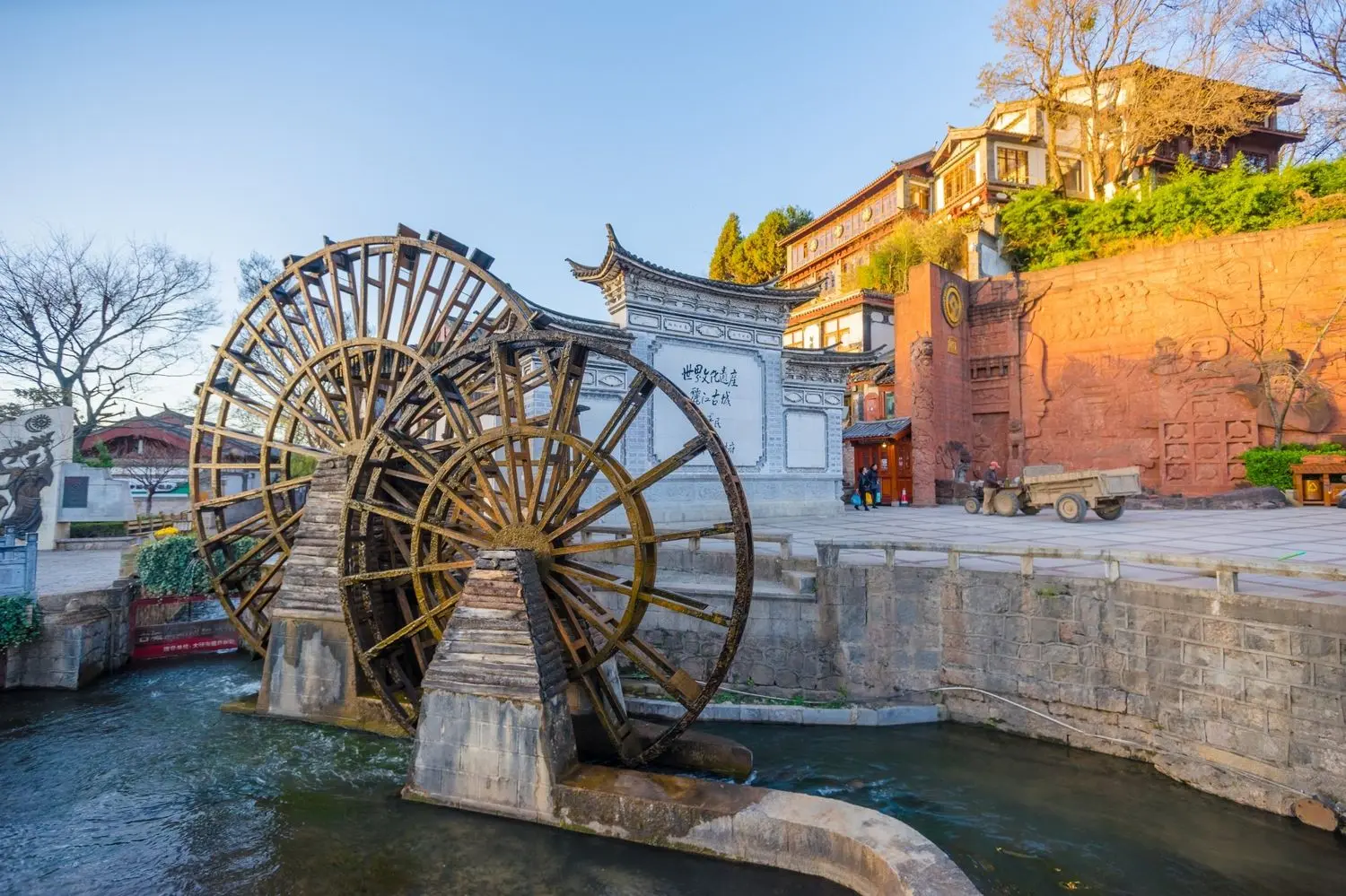 The iconic Big Waterwheel at Lijiang Ancient Town, showcasing the historic charm of Yunnan's UNESCO World Heritage Site.