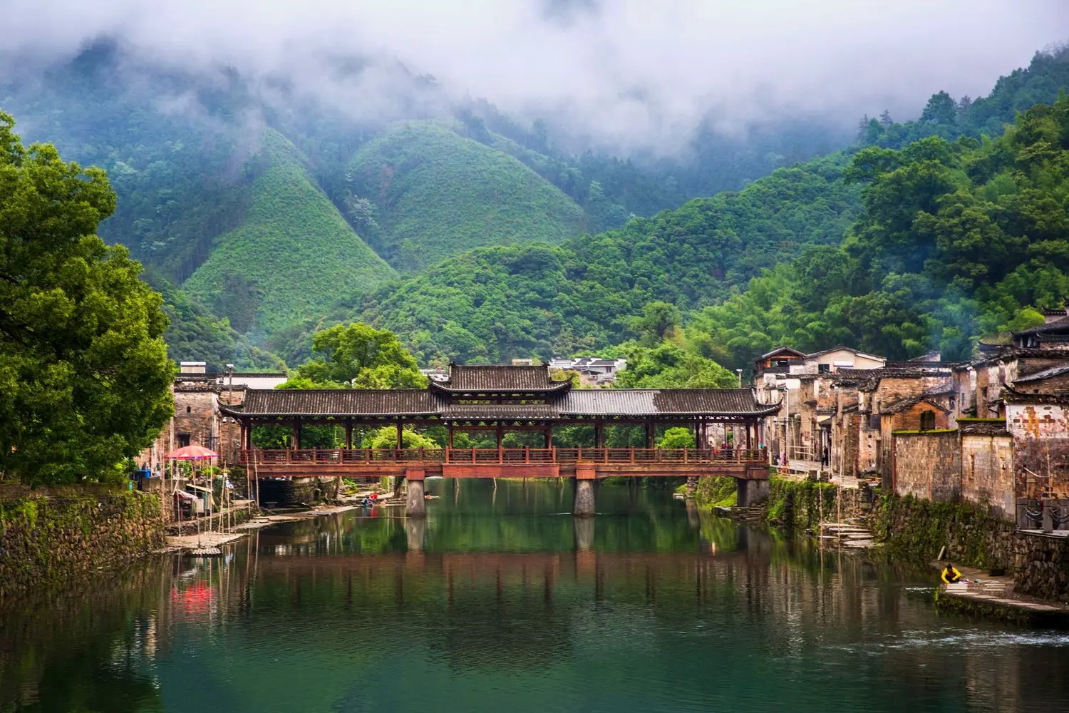 The picturesque Jingdezhen Ceramic Ancient Town, where traditional architecture, tranquil waterways and China's rich porcelain heritage come together.