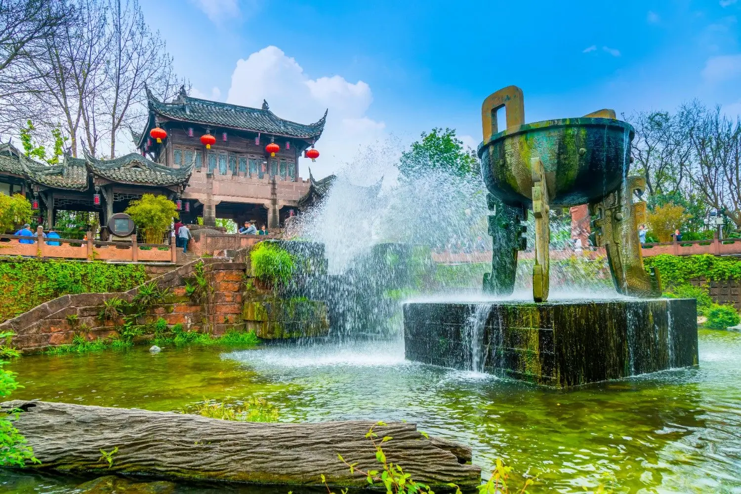 Dujiangyan Scenic Area in Sichuan, China, featuring the iconic bronze vessel fountain and the ancient Dujiangyan Irrigation System, a UNESCO World Heritage Site and one of China's greatest engineering wonders.