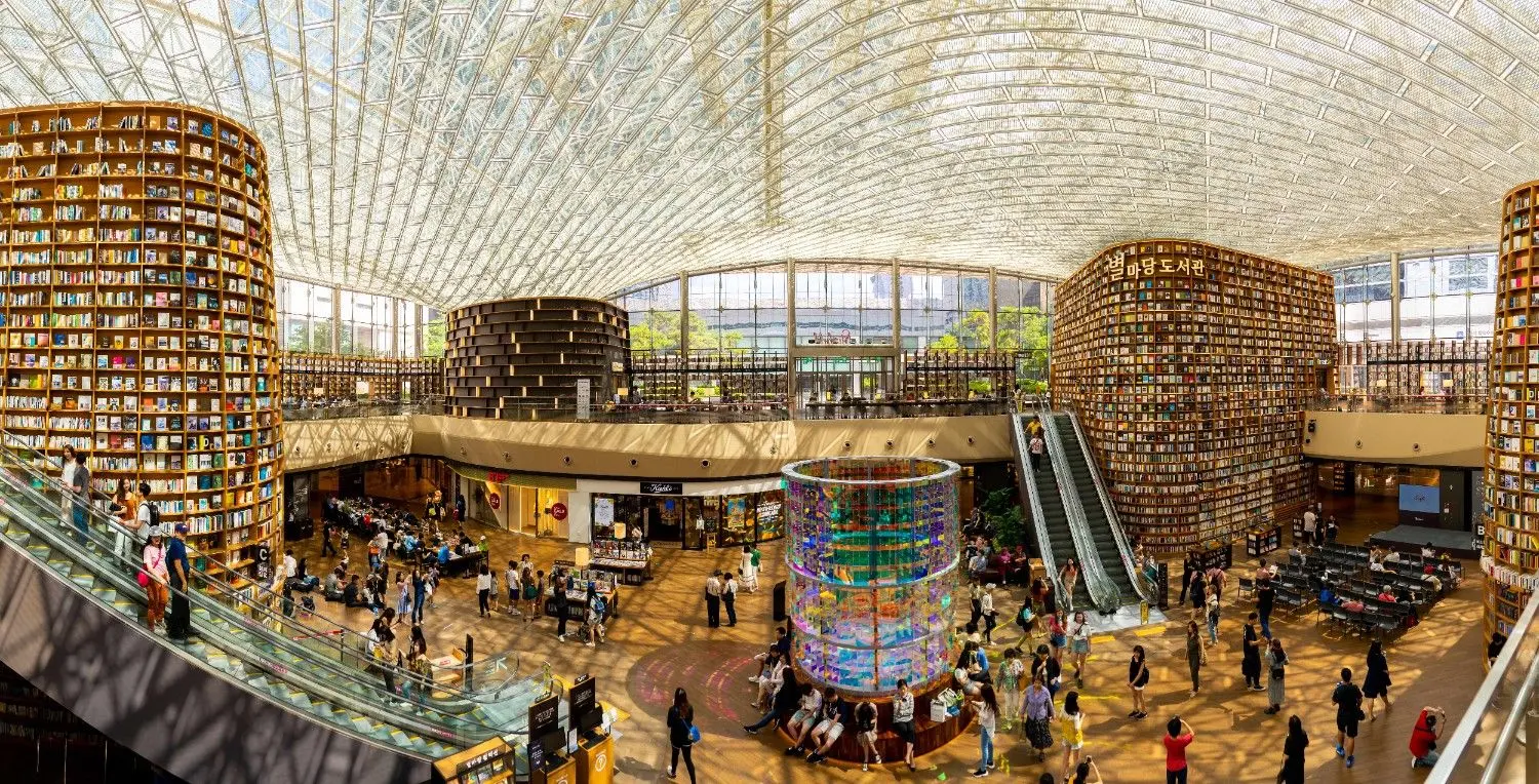 Starfield Library at COEX Mall in Seoul, South Korea, featuring towering floor-to-ceiling bookshelves, stunning modern architecture, and one of Seoul's most iconic indoor cultural attractions.