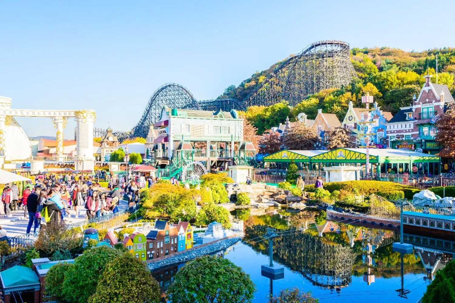 Everland Theme Park in Yongin, South Korea, featuring the iconic T Express wooden roller coaster, colorful European-style village, gardens, and family-friendly attractions.