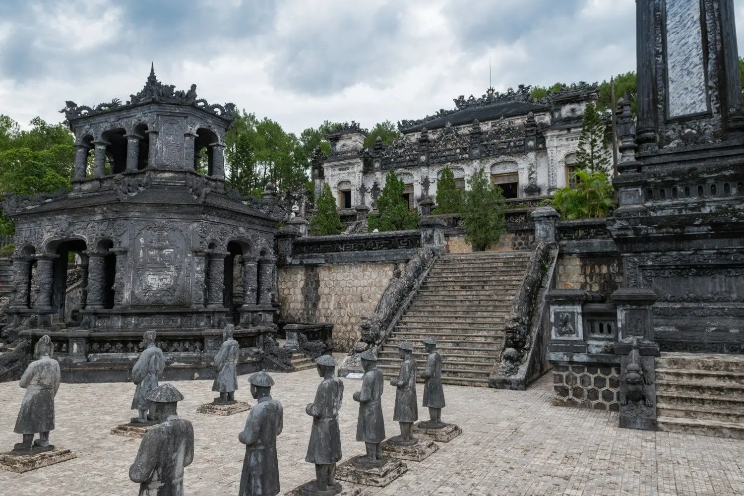 Khai Dinh Tomb in Hue, Vietnam, featuring the iconic stone mandarin statues, grand ceremonial courtyard, and impressive Nguyen Dynasty architecture, one of Hue's most remarkable royal mausoleums.