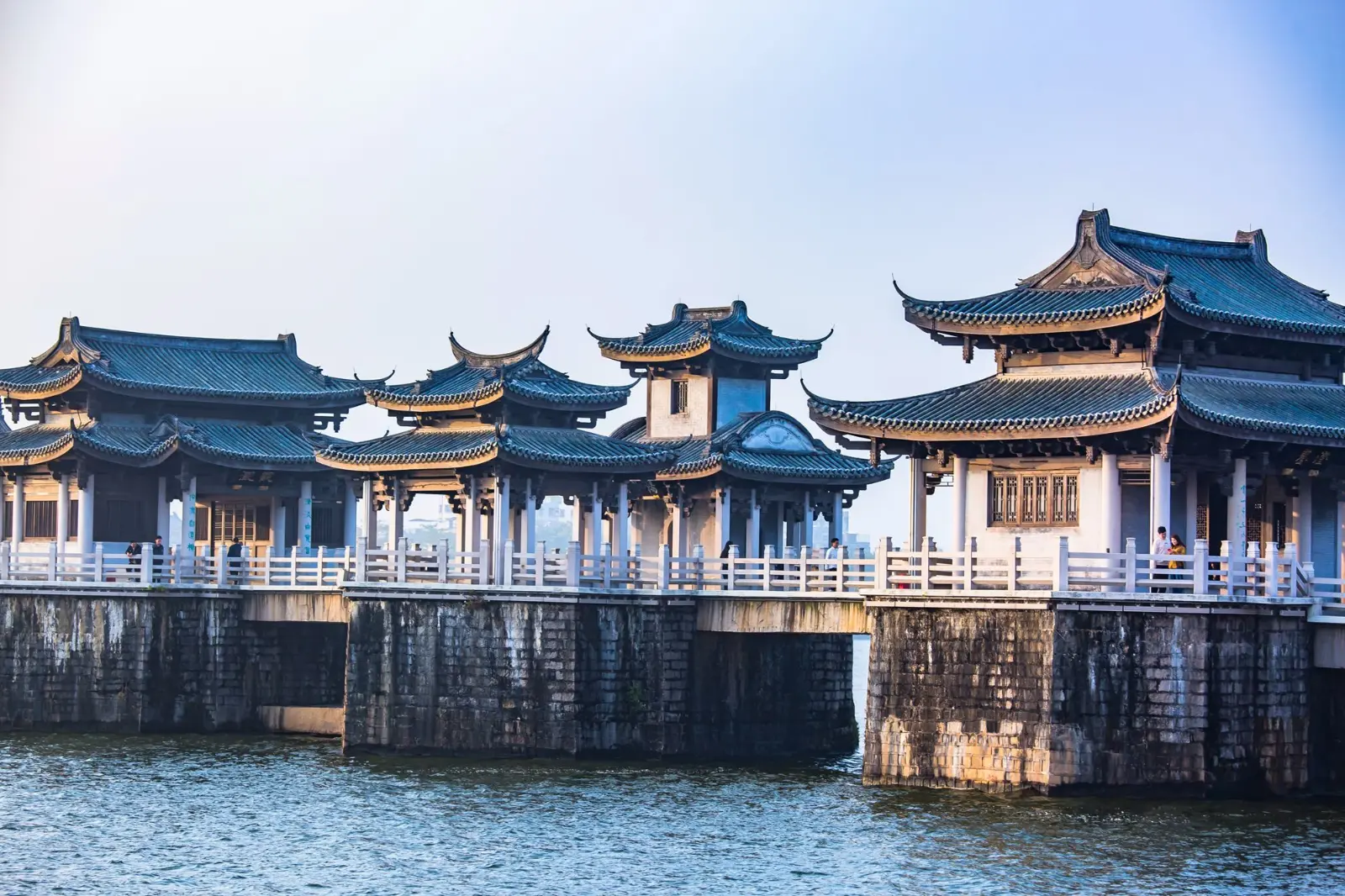 Guangji Bridge (Xiangzi Bridge) in Chaozhou, Guangdong, China, featuring traditional Chinese pavilions, historic stone piers, and one of the world's earliest pontoon bridges, recognized as an iconic landmark of Chaozhou's rich cultural heritage.