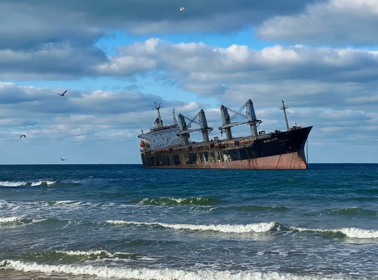 Blueways Shipwreck on the coast of Shantou, Guangdong, China, featuring a historic abandoned vessel resting offshore, dramatic ocean views, and a unique maritime landmark popular for coastal sightseeing and photography.