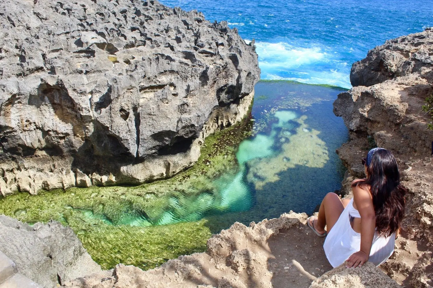 Angel's Billabong on Nusa Penida, Bali, Indonesia, featuring a crystal-clear natural infinity pool, dramatic limestone cliffs, and turquoise ocean views. One of Bali's most iconic coastal attractions, renowned for its stunning scenery and unique rock formations.