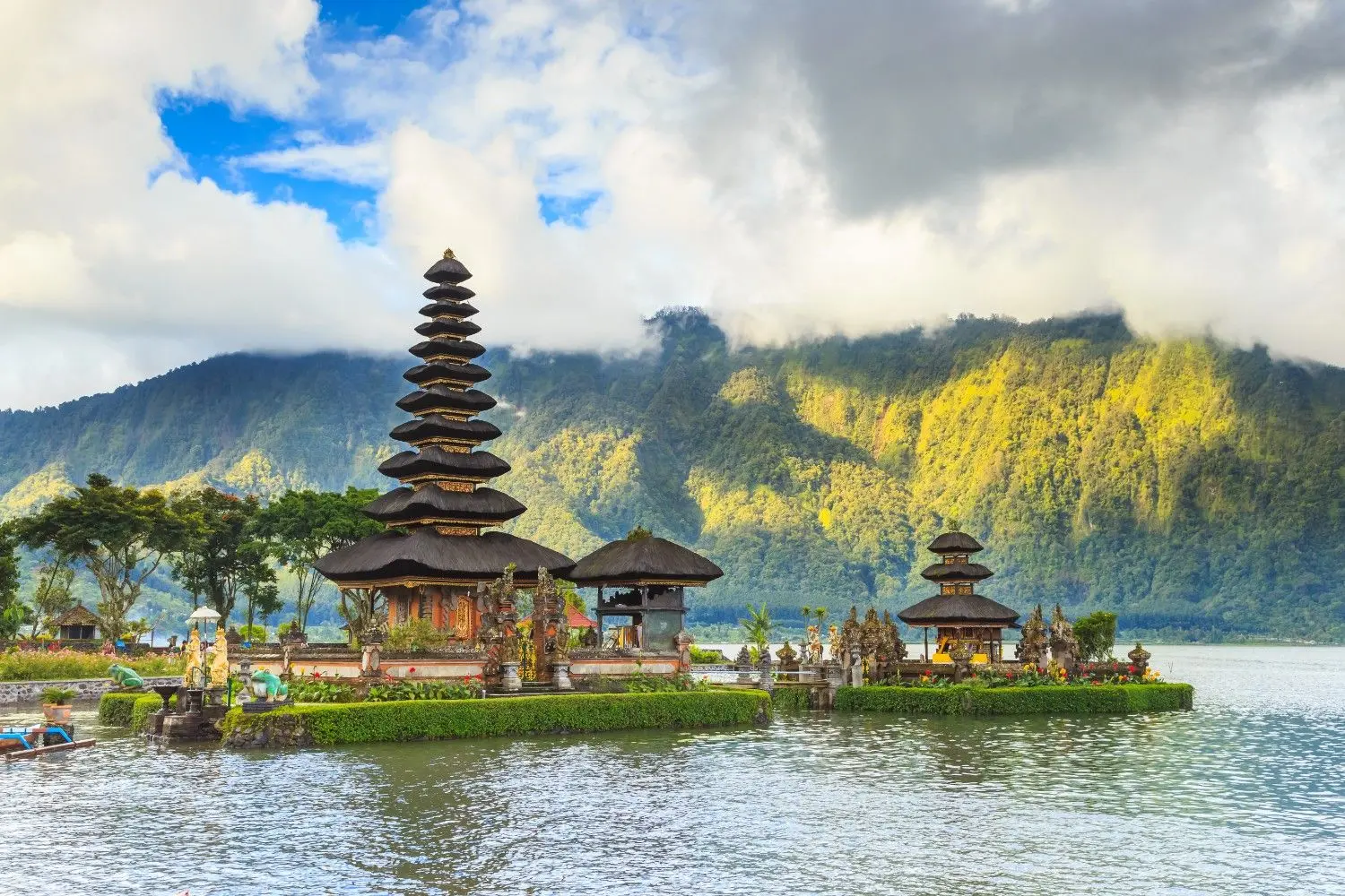 Ulun Danu Beratan Temple on Lake Beratan in Bedugul, Bali, Indonesia, featuring the iconic multi-tiered Balinese Hindu temple surrounded by tranquil lake waters and lush mountain scenery. One of Bali's most famous cultural landmarks, renowned for its breathtaking beauty and spiritual significance.