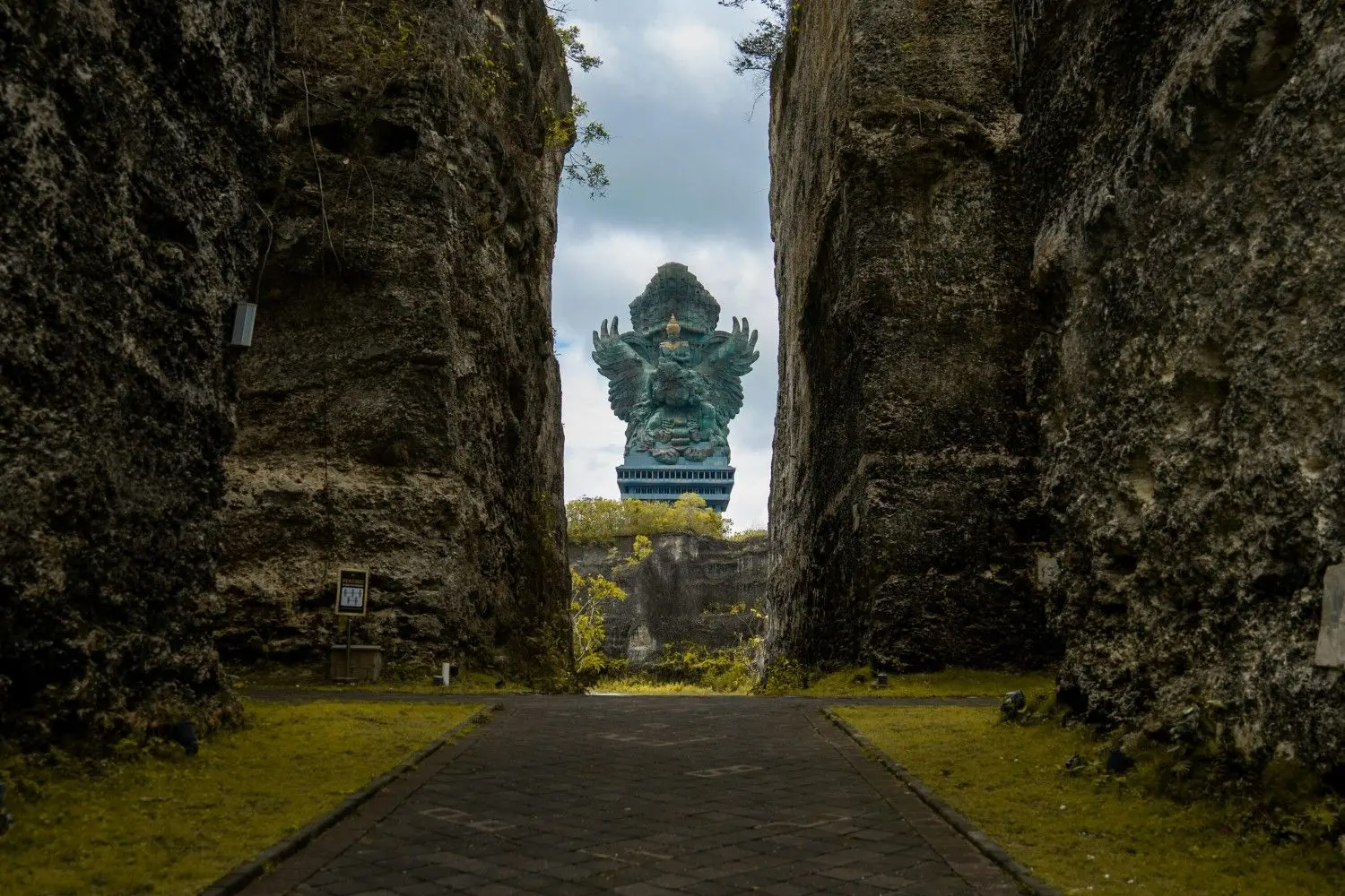 Garuda Wisnu Kencana (GWK) Cultural Park in Bali, Indonesia, featuring the monumental Garuda Wisnu Kencana statue framed by dramatic limestone cliffs. One of Bali's most iconic cultural landmarks, celebrated for its impressive sculpture, panoramic views, and rich Balinese heritage.