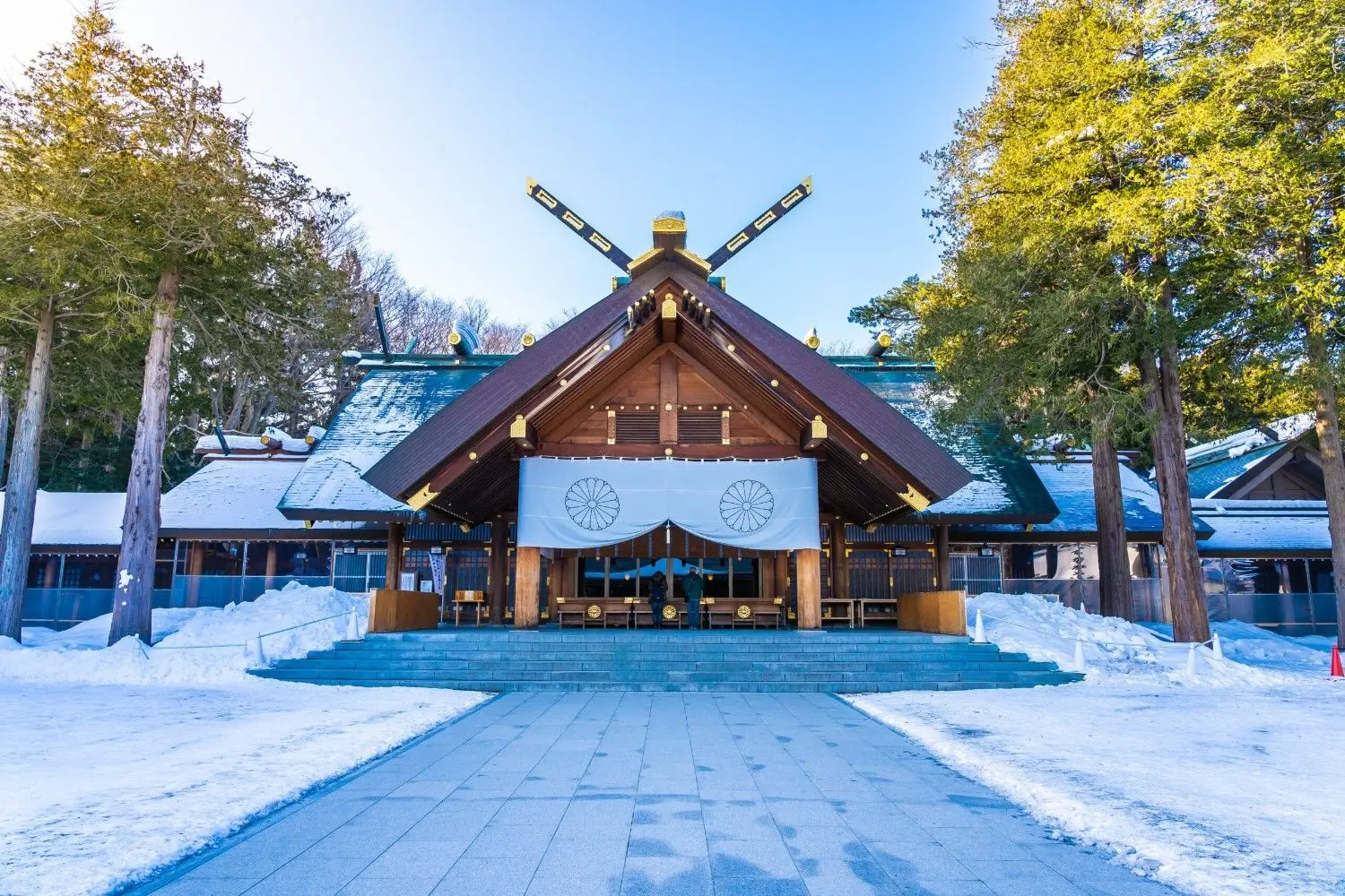 Hokkaido Shrine (Hokkaidō Jingū) in Sapporo, Hokkaido, Japan, featuring traditional Shinto architecture surrounded by snow-covered forests and peaceful shrine grounds. One of Hokkaido's most important spiritual landmarks, renowned for its cultural heritage, seasonal beauty, and tranquil atmosphere.