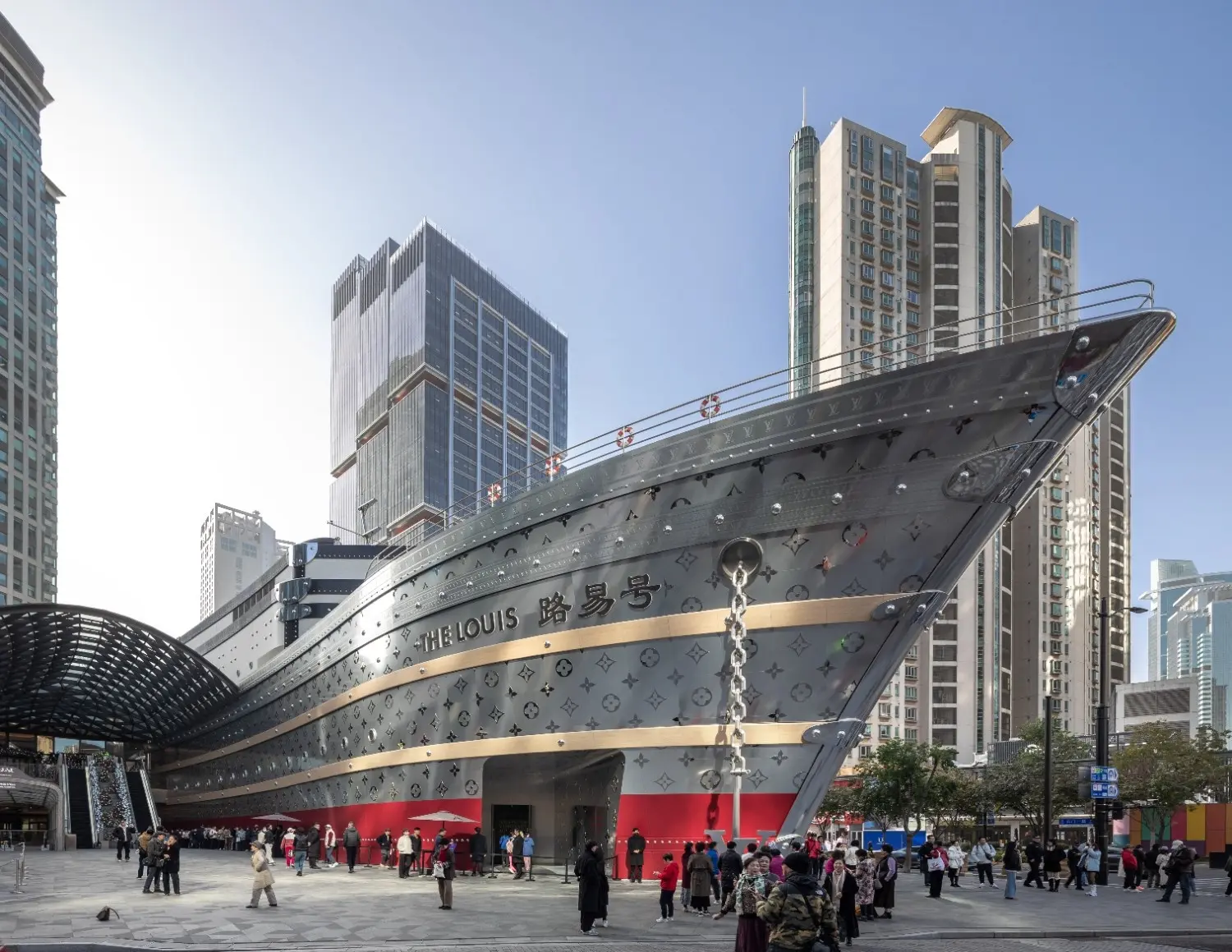 Louis Vuitton "The Louis" Ship in Shanghai, China, featuring the iconic ship-shaped flagship store with striking contemporary architecture inspired by luxury travel and ocean voyages. One of Shanghai's newest landmark attractions, combining Louis Vuitton fashion, immersive exhibitions, fine dining, and luxury retail experiences.