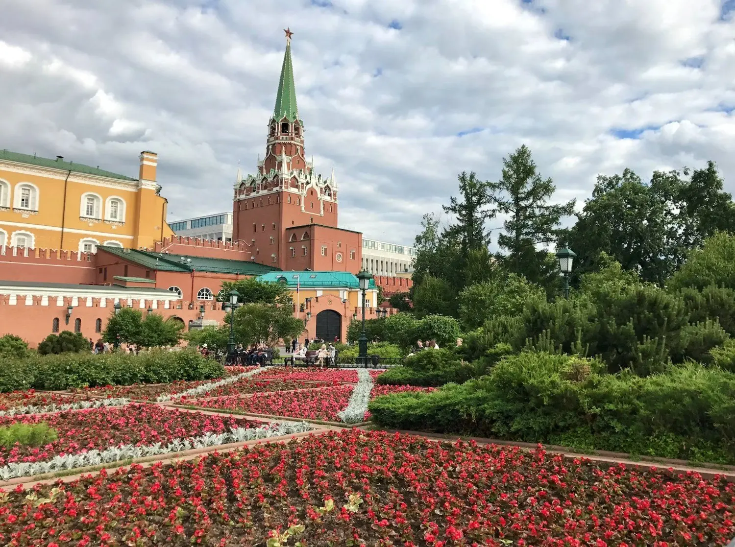 Alexander Garden beside the Moscow Kremlin in Moscow, Russia, featuring colorful flower gardens, historic Kremlin walls and towers, and beautifully landscaped grounds. One of central Moscow’s most famous public gardens, located next to Red Square and the Kremlin.