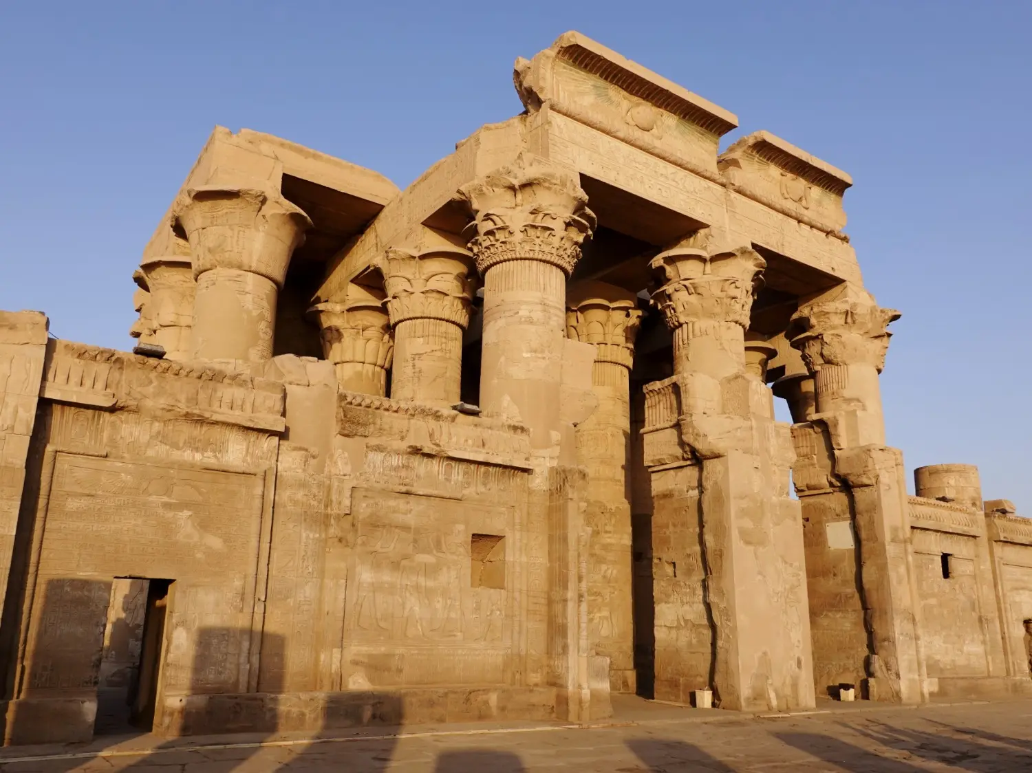 Kom Ombo Temple in Egypt, featuring ancient sandstone columns, monumental gateways, and remarkably preserved Egyptian architecture. This unique double temple was dedicated to the crocodile god Sobek and the falcon god Horus.